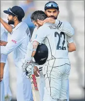  ??  ?? Virat Kohli congratula­tes New Zealand skipper Kane Williamson after they won the WTC final at The Ageas Bowl last month.