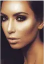  ??  ?? Kim Kardashian is known for her sun- kissed looks.