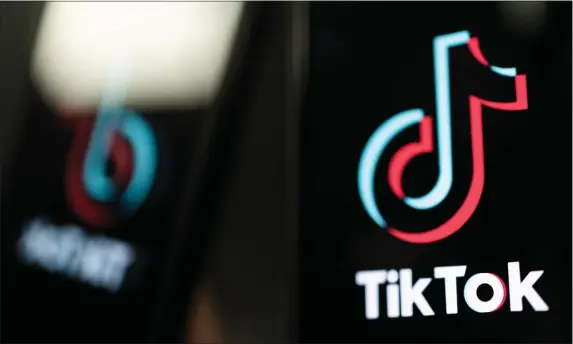  ?? DAN KITWOOD — GETTY IMAGES/TNS ?? In this photo illustrati­on, a TikTok logo is displayed on an iPhone on Feb. 28, 2023, in London, England.