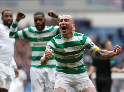  ?? REUTERS/RUSSELL CHEYNE ?? Scott Brown celebrates after Celtic’s victory over Rangers at Ibrox