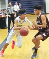  ?? File photo ?? Dante Aviles-Santos, left, and Cumberland suffered a 58-45 defeat to Classical Monday.