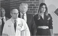  ?? NICHOLAS KAMM, AFP/GETTY IMAGES ?? Ira Rabin escorts President Trump and first lady Melania Trump, who visited Rep. Steve Scalise, R-La., at MedStar Washington Hospital Center on June 14 after Scalise was shot.