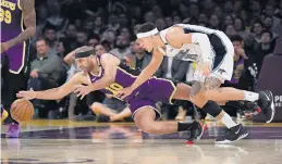  ?? MARK J. TERRILL/ASSOCIATED PRESS FILE ?? There are multiple scenarios available to the NBA for a restart, and players like the Los Angeles Lakers’ Jared Dudley, left, have said they have faith in Adam Silver and the league.