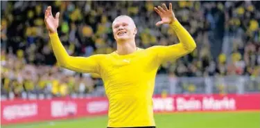  ?? ?? ↑
Borussia Dortmund’s Erling Haaland celebrates after scoring against Mainz during their German League match in Dortmund on Saturday.