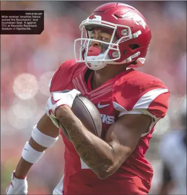  ??  ?? PHOTO BY BEN GOFF Wide receiver Jonathan Nance scored the Razorbacks’ lone touchdown Sept. 9 against TCU at Reynolds Razorback Stadium in Fayettevil­le.