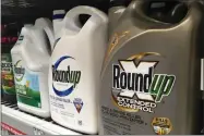  ?? AP FILE PHOTO BY HAVEN DALEY ?? In this Feb. 24, 2019, file photo, containers of Roundup are displayed on a store shelf in San Francisco. A Northern California judge has upheld a jury’s verdict that Monsanto’s Roundup herbicide caused cancer in a couple but reduced damages from $2 billion to $86.7 million.