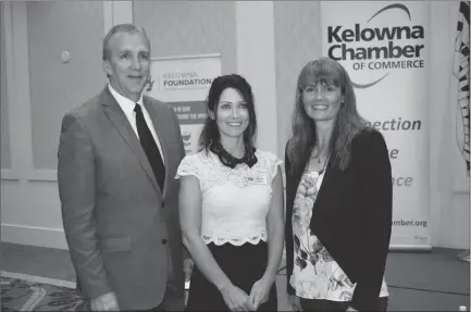  ?? STEVE MacNAULL/The Okanagan Weekend ?? B.C.’s top cop, commanding officer Brenda Butterwort­h-Carr, right, spoke at a Kelowna Chamber of Commerce lunch Friday at the Coast Capri Hotel. She’s pictured here with chamber executive director Dan Rogers and chamber president Carmen Sparg.