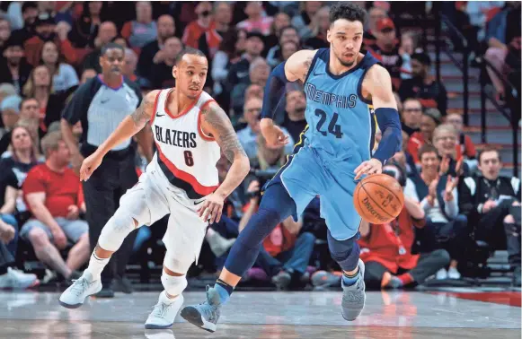 ??  ?? Second-round draft pick Dillon Brooks, right, started 74 games for the Grizzlies last season. CRAIG MITCHELLDY­ER / AP