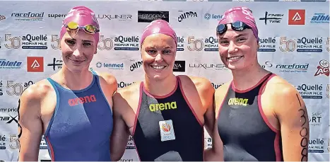  ?? ?? The Midmar Mile’s elite women’s podium comprised (from left) Ashley Twitchell, Sharon van Rouwendaal and Stephanie Houtman at Midmar Dam in Howick. Photo: Action Photo SA