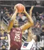  ?? Bill Kostroun / Associated Press ?? Florida State’s Mfiondu Kabengele (25) attempts a shot over UConn’s Kassoum Yakwe on Saturday.