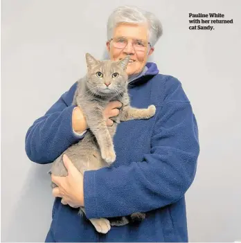  ?? ?? Pauline White with her returned cat Sandy.