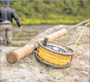  ??  ?? A Swedish reel, a Danielson, on a Sage rod fishing for salmon in Norway.