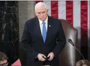  ?? SAUL LOEB/ASSOCIATED PRESS ?? Vice President Mike Pence presides over a joint session of Congress as it convenes to count the Electoral College votes cast in November’s election, at the Capitol in Washington, Jan. 6, 2021.