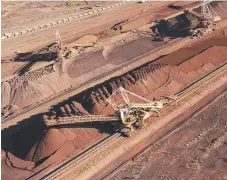  ??  ?? Iron ore production out of Port Hedland has been reduced.