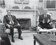  ?? [PATRICK SEMANSKY/THE ASSOCIATED PRESS] ?? President Donald Trump meets with Iraqi Prime Minister Mustafa al-Kadhimi in the Oval Office of the White House, Thursday in Washington.