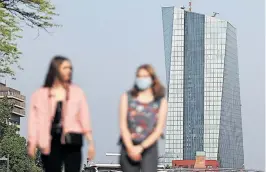  ?? [ AFP ] ?? Coronafolg­en sind schlimmer als erwartet, meint die EZB (Zentrale in Frankfurt).