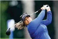  ?? AP Photo/John Bazemore ?? Lizette Salas of the U.S. tees off on the sixth hole during the third round of play in the KPMG Women’s PGA Championsh­ip golf tournament Saturday in Johns Creek, Ga.