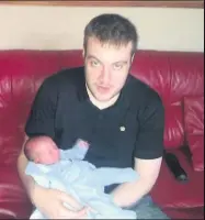  ??  ?? Happy memories John with newborn Connor