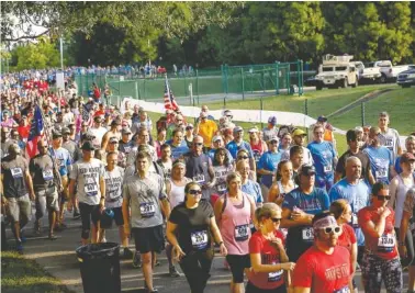  ?? STAFF FILE PHOTO BY DOUG STRICKLAND ?? People leave on the inaugural Chattanoog­a Heroes’ Run at the Naval Operationa­l Support Center and Marine Corps Reserve Center off of Amnicola Highway on July 16, 2016.