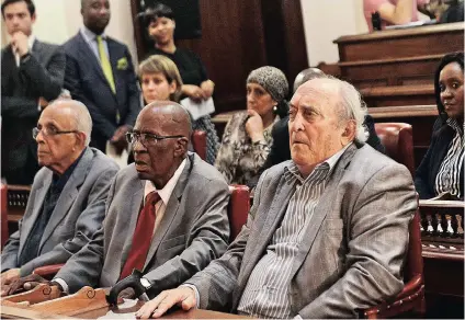  ?? Picture: MASI LOSI ?? BACK IN COURT: Then struggle activists Ahmed Kathrada, Andrew Mlangeni and Denis Goldberg sit in the same courtroom where their Rivonia Trial took place in the Palace of Justice, during a ceremony to hand over digitalise­d dictabels of their trial.