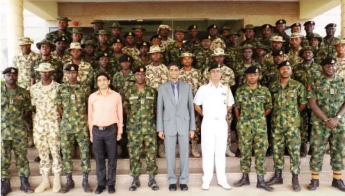  ??  ?? The Indian High Commission­er to Nigeria, Shri B.N Reddy with 60 Nigerian Army personnel, before their departure for India to undergo a six- week extensive training that includes highly specialize­d fields of weaponry and communicat­ion