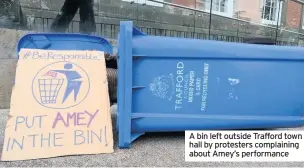  ??  ?? A bin left outside Trafford town hall by protesters complainin­g about Amey’s performanc­e