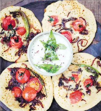  ?? DAVID LOFTUS ?? “It’s a fun thing to make because it feels like a variation on a pancake,” Meera Sodha, author of Fresh India: 130 Quick, Easy and Delicious Recipes for Every Day, says of her uttapams.