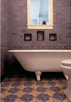  ??  ?? OPPOSITE The barelypink sink and pink tiles have been in this 1925 Seattle bungalow since the beginning, as has the tiled-in medicine cabinet with beveled mirror and crystal knob ( far left). LEFT With deep-lavender wall tiles, deco tile inserts, and a bold geometric tile floor, this more recent bathroom has a Twenties vibe.