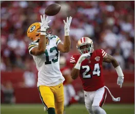  ?? NHAT V. MEYER — BAY AREA NEWS GROUP, FILE ?? The Packers’ Allen Lazard (13) makes a catch against the 49ers’ K’Waun Williams (24) in the first quarter of a 2021game at Levi’s Stadium in Santa Clara.