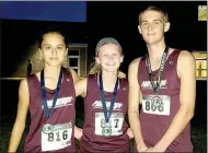  ?? Photo submitted ?? Siloam Springs ninth-grade runners, from left, Kailey Pentz, Rebecca Rodgers and Thomas Bridgeman received medals Tuesday at the Wolf Run hosted by Bentonvill­e Fulbright Junior High.