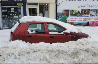  ??  ?? Hopefully we won’t have to deal with this level of snow again for another few decades.