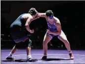  ?? AIMEE BIELOZER — FOR THE MORNING JOURNAL ?? Keystone’s Jordan Folmer takes on Brunswick’s Michael Dunleavy at 215pounds during a Dec. 13dual in the school match.