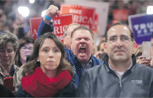  ?? CHIP SOMODEVILL­A/ GETTY IMAGES ?? Supporters cheer then-Republican presidenti­al candidate Donald Trump during a campaign rally in Sterling Heights, Mich. Researcher­s from the University of Southern California found that in the U.S. presidenti­al election, 19 per cent of all tweets...