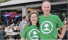  ?? BRANDY FORD SPECIAL TO THE WELLAND TRIBUNE ?? Gord and Anne Harold stand in front of a crowd at the 10th, and final, Owenpalooz­a.