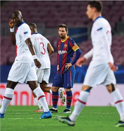  ?? PICTURE: GETTY ?? Fall from grace:
Messi cuts a forlorn figure during Barcelona’s defeat to Paris Saint-Germain