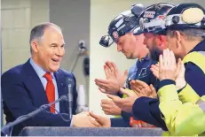  ?? GENE J. PUSKAR/ASSOCIATED PRESS ?? EPA Administra­tor Scott Pruitt greets coal miners during a visit to Consol Pennsylvan­ia Coal Co.’s Harvey Mine in Sycamore, Pa., earlier this month.