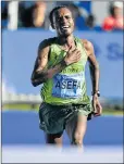  ?? IMAGES Picture: GALLO ?? UNSTOPPABL­E: Ethiopia’s Asefa Negewo defended his title to win the Men’s Cape Town Marathon yesterday. He dominated a quality field winning in a time of 2 hours 10 minutes and 1 second