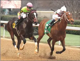  ?? (The Sentinel-Record/Richard Rasmussen) ?? Amy’s Challenge (left), a 6-year-old mare trained by Mac Robertson, returns for her fourth season at Oaklawn Racing Casino Resort in Hot Springs. Last season, she finished second twice and fourth once in three Oaklawn stakes attempts.