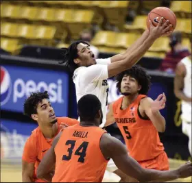  ?? Cliff Grassmick / Staff Photograph­er ?? Third-year sophomore Keeshawn Barthelemy, shown Feb. 8 against Oregon State, owns the inside track to start at point guard for CU.