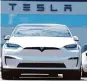  ?? Associated Press ?? Since last year, Tesla has cut prices as much as $20,000 as it faced slowing demand.