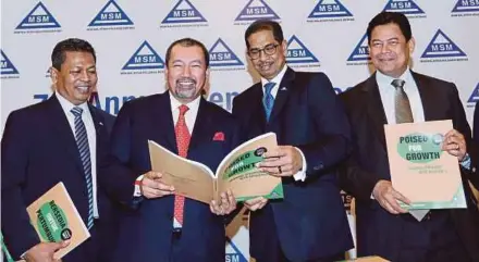  ?? ROSELA ISMAIL ?? (From left) MSM Malaysia Holdings Bhd acting chief executive officer Mohd Shaffie Said, chairman Datuk Azhar Abdul Hamid, and directors Datuk Khairil Anuar Aziz and Datuk Zakaria Arshad at the company’s shareholde­rs meeting in Kuala Lumpur yesterday.