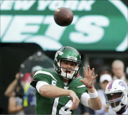  ?? SETH WENIG - THE ASSOCIATED PRESS ?? FILE - In this Sept. 8, 2019, file photo, New York Jets quarterbac­k Sam Darnold (14) throws a pass during the second half of an NFL football game against the Buffalo Bills, in East Rutherford, N.J.