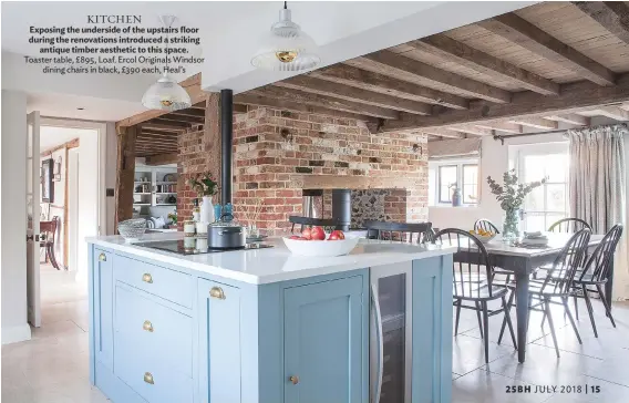  ??  ?? KITCHEN Exposing the underside of the upstairs floor during the renovation­s introduced a striking antique timber aesthetic to this space. Toaster table, £895, Loaf. Ercol Originals Windsor dining chairs in black, £390 each, Heal’s