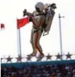  ?? BOB THOMAS/GETTY IMAGES FILE PHOTO ?? A man flies into the L.A. Coliseum on a jetpack during the opening ceremony of the 1984 Games.