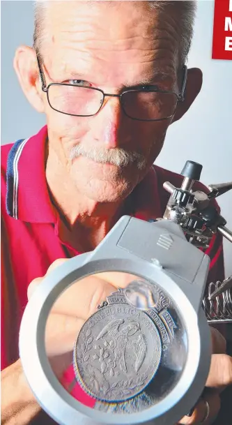  ?? Picture: SCOTT RADFORD- CHISHOLM ?? TREASURED FIND: Chris Brown with the World War gramophone he scavenged from a rubbish tip.
I medal he found 50 years ago in a
