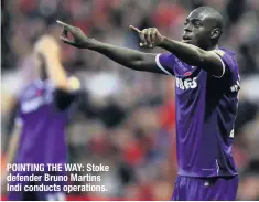  ??  ?? POINTING THE WAY: Stoke defender Bruno Martins Indi conducts operations.