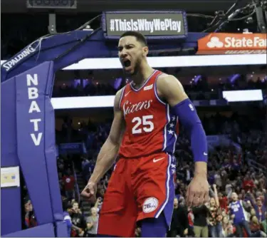  ?? MATT SLOCUM — THE ASSOCIATED PRESS ?? Philadelph­ia 76ers’ Ben Simmons reacts after being fouled during the second half of the team’s NBA basketball game against the Denver Nuggets, Friday in Philadelph­ia. Philadelph­ia won 117-110.