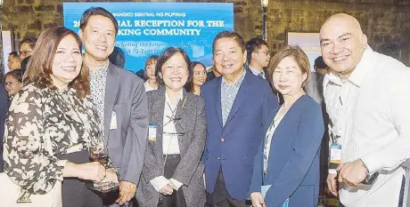  ?? ?? Former BSP governor Say Tetangco reunites with (from left) BSP Senior Assistant Governor Edna Villa, former Monetary Board member Peter Favila, Go, BDO chairperso­n Tessie Sy and journalist Dax Lucas.