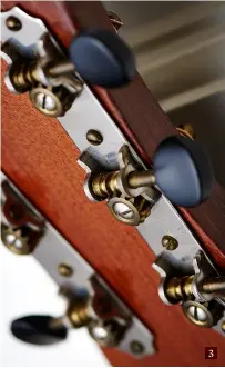  ??  ?? 3 1. The KG-14 was born at the old Gibson factory in Kalamazoo, Michigan at a time when few could afford one of the brand’s more deluxe guitars… 3. The black button open tuners are another clue that you’re dealing with a Kalamazoo