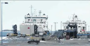  ??  ?? The MV Confederat­ion, left, and Holiday Island are shown docked at the Wood Islands terminal.